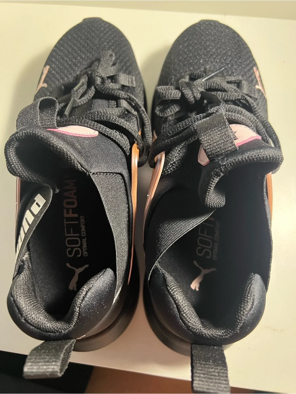 Puma Women's Black with Rose Gold Accent Athletic Sneakers